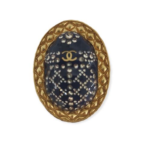 chanel egyptian collection brooches|chanel in hieroglyphics.